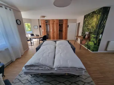 Ein Bett oder Betten in einem Zimmer der Unterkunft Ferienwohnung am Radweg