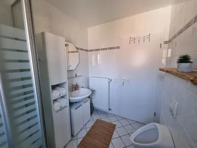 Ein Badezimmer in der Unterkunft Ferienwohnung am Radweg