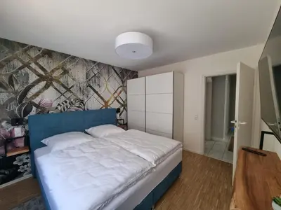 Ein Bett oder Betten in einem Zimmer der Unterkunft Ferienwohnung am Radweg