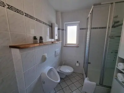 Ein Badezimmer in der Unterkunft Ferienwohnung am Radweg