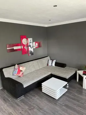 Ein Sitzbereich in der Unterkunft Ferienwohnung Klatschmohn