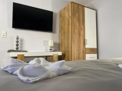 Ein Bett oder Betten in einem Zimmer der Unterkunft Vulkanoase Eifel - Wellness