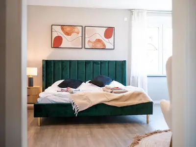 Ein Bett oder Betten in einem Zimmer der Unterkunft Design Apartment zentral für 6 in Andernach: Ausblick, WiFi, Küche