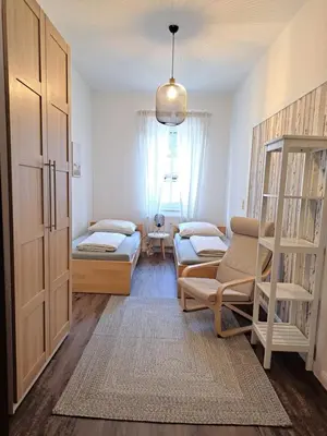 Ein Bett oder Betten in einem Zimmer der Unterkunft Blick zum Brückentor