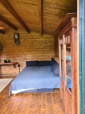 Ein Bett oder Betten in einem Zimmer der Unterkunft Guesthouse Wallenborn - Lodge