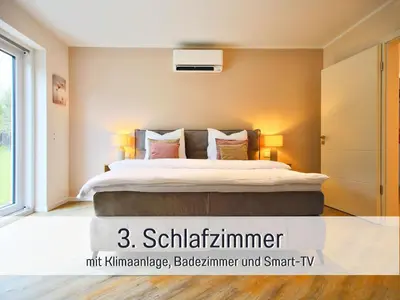 Ein Bett oder Betten in einem Zimmer der Unterkunft Villa Heimat am Nationalpark