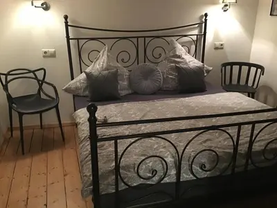 Ein Bett oder Betten in einem Zimmer der Unterkunft Ferienhaus-Barz