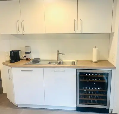 Küche/Küchenzeile in der Unterkunft Ferienapartment Auszeit- Sauna, Whirlpool und Garten zur Alleinnutzung