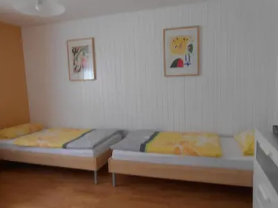 Ein Bett oder Betten in einem Zimmer der Unterkunft Ferienwohnung Hecking