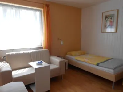 Ein Bett oder Betten in einem Zimmer der Unterkunft Ferienwohnung Hecking