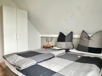 Ein Bett oder Betten in einem Zimmer der Unterkunft Charmantes Ferienhaus an der Mosel