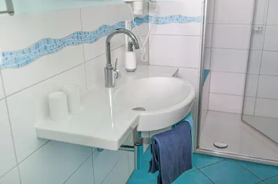 Ein Badezimmer in der Unterkunft Ferienwohnungen Landgasthaus Janshen