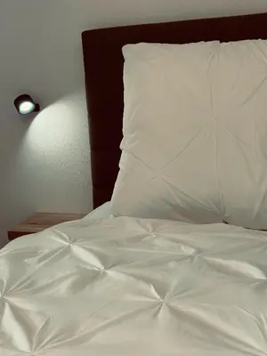 Ein Bett oder Betten in einem Zimmer der Unterkunft Flussbett - Appartement an der Mosel