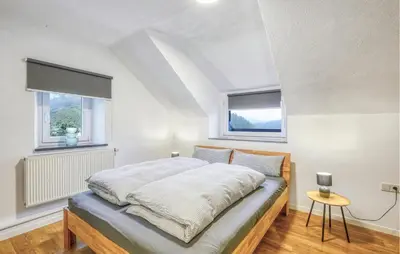 Ein Bett oder Betten in einem Zimmer der Unterkunft Beautiful Home In Nimsreuland With Wifi