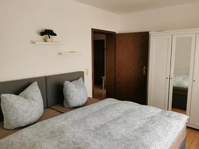 Ein Bett oder Betten in einem Zimmer der Unterkunft Ferienwohnung am Nationalpark Hunsrück Hochwald