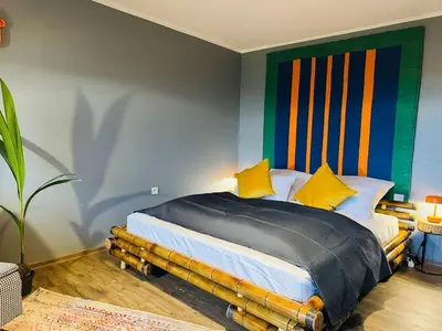 Ein Bett oder Betten in einem Zimmer der Unterkunft Klassen Stay - Design Studio in 11 Etage - Tolle Aussicht - Sauna, Pool - Netflix