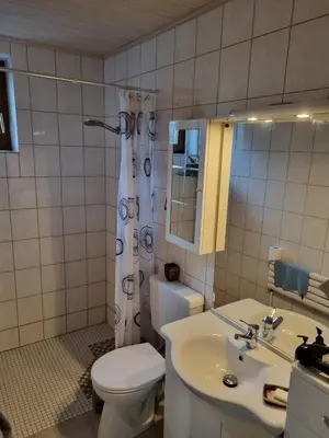 Ein Badezimmer in der Unterkunft Ferienwohnung auf Kampen