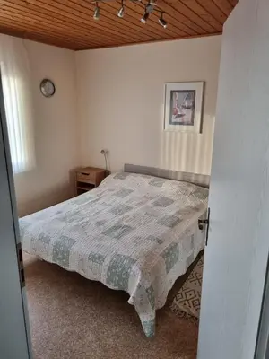 Ein Bett oder Betten in einem Zimmer der Unterkunft Ferienwohnung auf Kampen