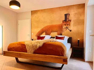 Ein Bett oder Betten in einem Zimmer der Unterkunft Reet am Rhein - Eröffnungsangebot