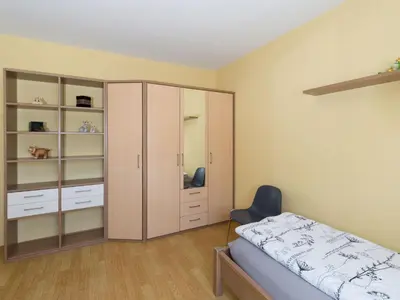 Ein Bett oder Betten in einem Zimmer der Unterkunft Ferienwohnung Haus Nahetal