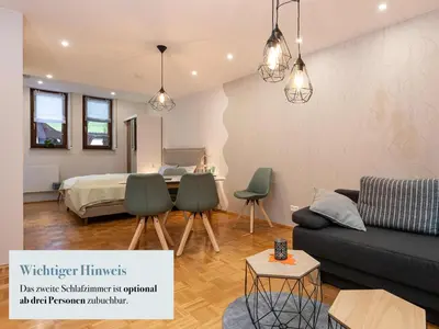 Ein Sitzbereich in der Unterkunft Ferienapartment Am Gaulsbach