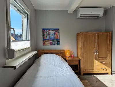 Ein Bett oder Betten in einem Zimmer der Unterkunft Apartmenthaus GOLDGRUBE