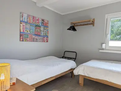Ein Bett oder Betten in einem Zimmer der Unterkunft Apartmenthaus GOLDGRUBE