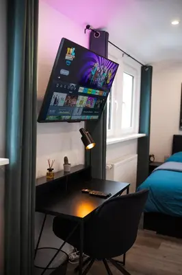 TV/Unterhaltungsangebot in der Unterkunft MODERNHOUSE KO26