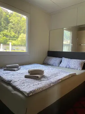 Ein Bett oder Betten in einem Zimmer der Unterkunft Hausboot im Hafen