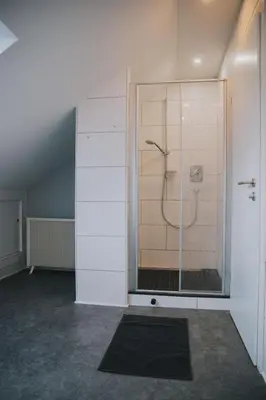 Ein Badezimmer in der Unterkunft Ferienwohnung Uljana