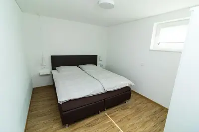 Ein Bett oder Betten in einem Zimmer der Unterkunft Ferienweingut Ulrike Thul