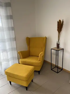 Ein Sitzbereich in der Unterkunft Sunset Apartment mit Rheinblick in Urbar