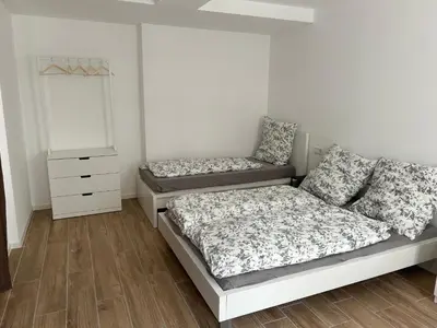 Ein Bett oder Betten in einem Zimmer der Unterkunft LuxAppartement Trier