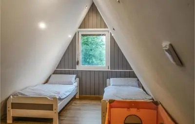 Ein Bett oder Betten in einem Zimmer der Unterkunft Lovely Home In Kerschenbach With Wifi