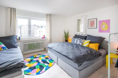 Ein Bett oder Betten in einem Zimmer der Unterkunft Pop Art Loft über den Dächern von Koblenz