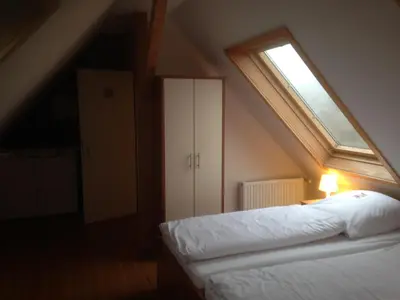 Ein Bett oder Betten in einem Zimmer der Unterkunft Landhaus Balkhausen