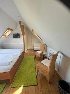 Ein Bett oder Betten in einem Zimmer der Unterkunft Landhaus Balkhausen