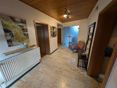Ein Sitzbereich in der Unterkunft Ferienwohnung Hennessy