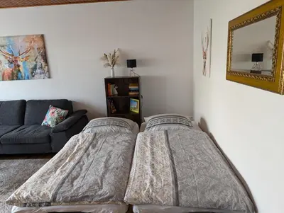 Ein Bett oder Betten in einem Zimmer der Unterkunft Ferienwohnung Hennessy