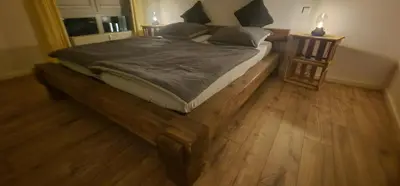 Ein Bett oder Betten in einem Zimmer der Unterkunft Suite mit Moselblick
