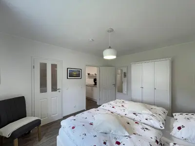 Ein Bett oder Betten in einem Zimmer der Unterkunft Ferienhaus Ty Maya