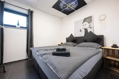 Ein Bett oder Betten in einem Zimmer der Unterkunft Studio Trier-Petrisberg