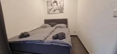 Ein Bett oder Betten in einem Zimmer der Unterkunft Studio Trier-Petrisberg