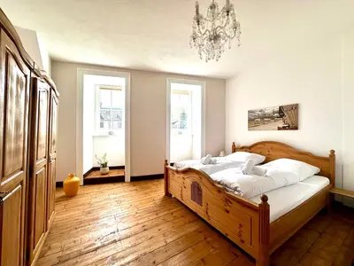 Ein Bett oder Betten in einem Zimmer der Unterkunft Ferienwohnungen-Traben-Trarbach