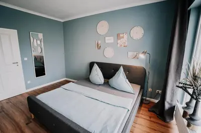 Ein Bett oder Betten in einem Zimmer der Unterkunft Soonwald Haus I Hot Tube I Whirlpool I Kamin