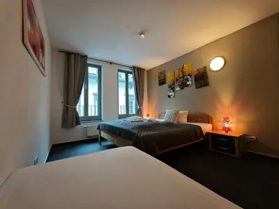 Ein Bett oder Betten in einem Zimmer der Unterkunft Bacchus Holiday Homes
