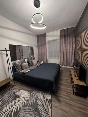 Ein Bett oder Betten in einem Zimmer der Unterkunft 3 Zimmer Apartment mitten in Altstadt - Koblenz