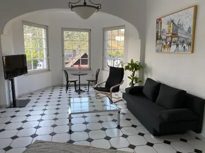 Ein Sitzbereich in der Unterkunft Ferienwohnung Auszeit