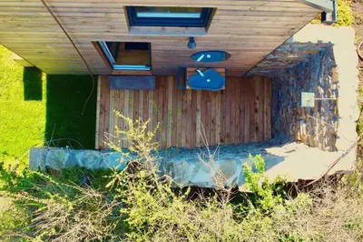Ein Garten an der Unterkunft Tinyhouse Minimalus Panorama Schlafloft im Grünen