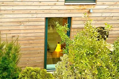 Ein Garten an der Unterkunft Tinyhouse Minimalus Panorama Schlafloft im Grünen